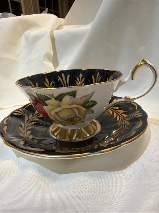 Queen Anne tea cup and saucer - Visible Wear