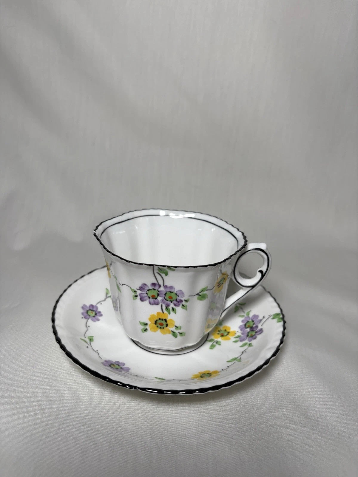 Phoenix China England Cup & Saucer Floral Black Trim Vintage- Small Chip- Pings