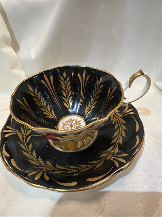 Queen Anne tea cup and saucer - Visible Wear