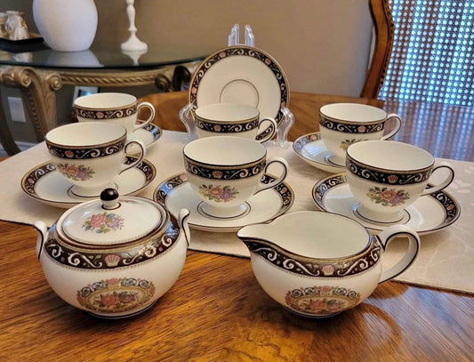 Wedgwood Runnymede brown cups & saucers, cream & lidded sugar. W 4577