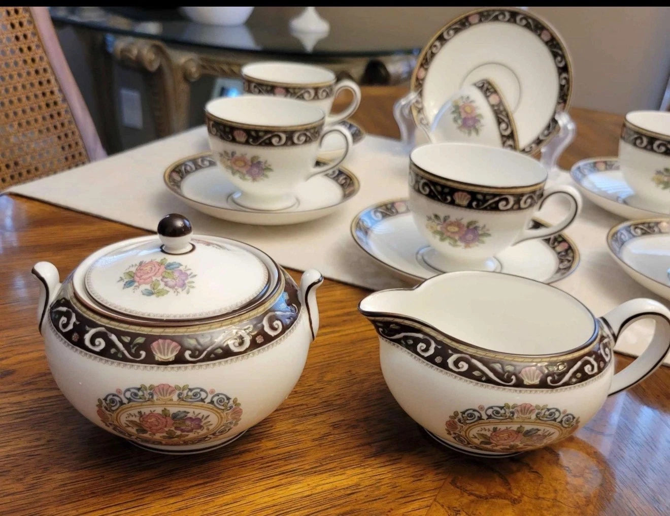 Wedgwood Runnymede brown cups & saucers, cream & lidded sugar. W 4577