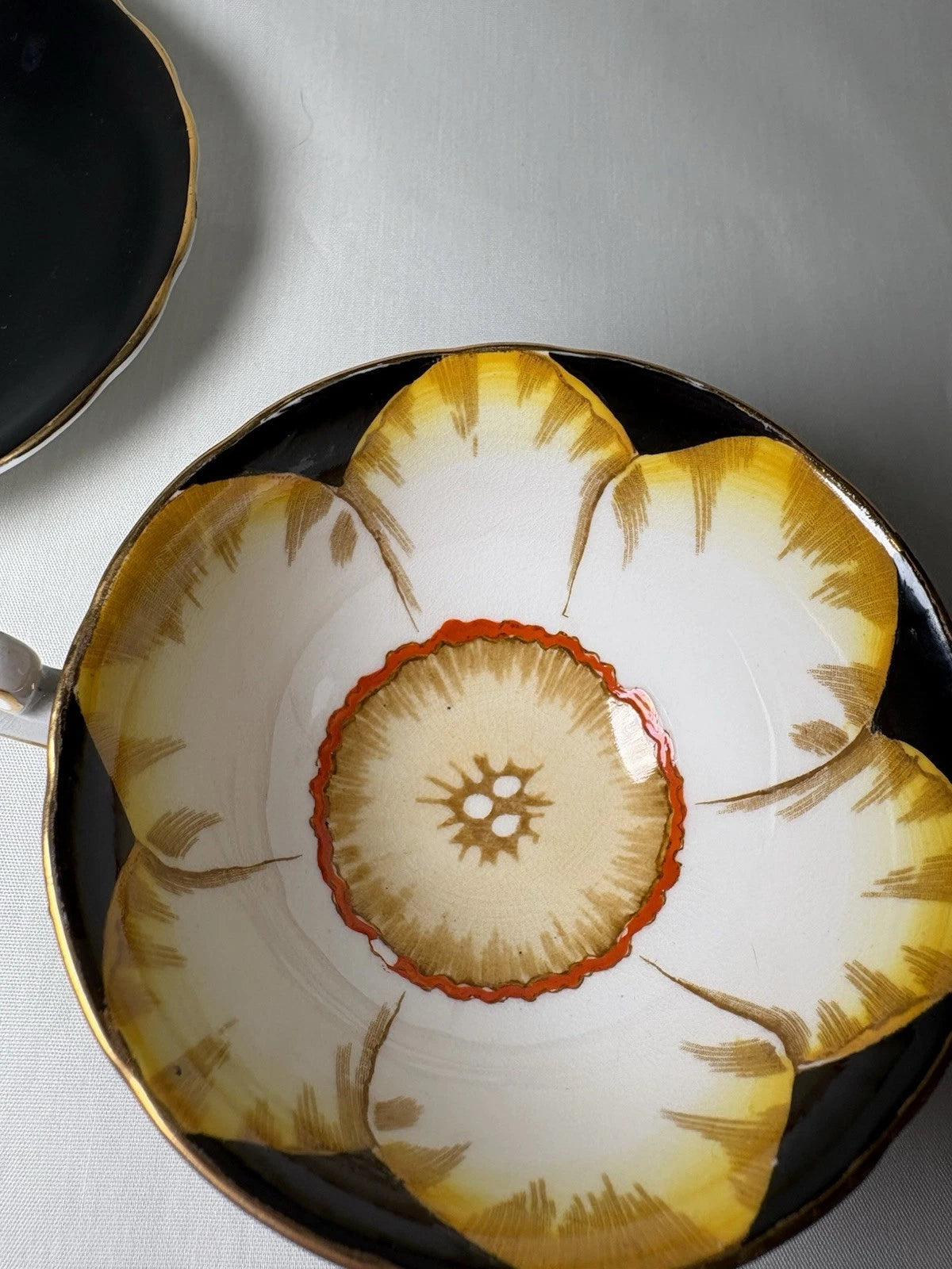 Victoria C&E Bone China “Jonquil” Teacup & Saucer Black Gold England- Crazing